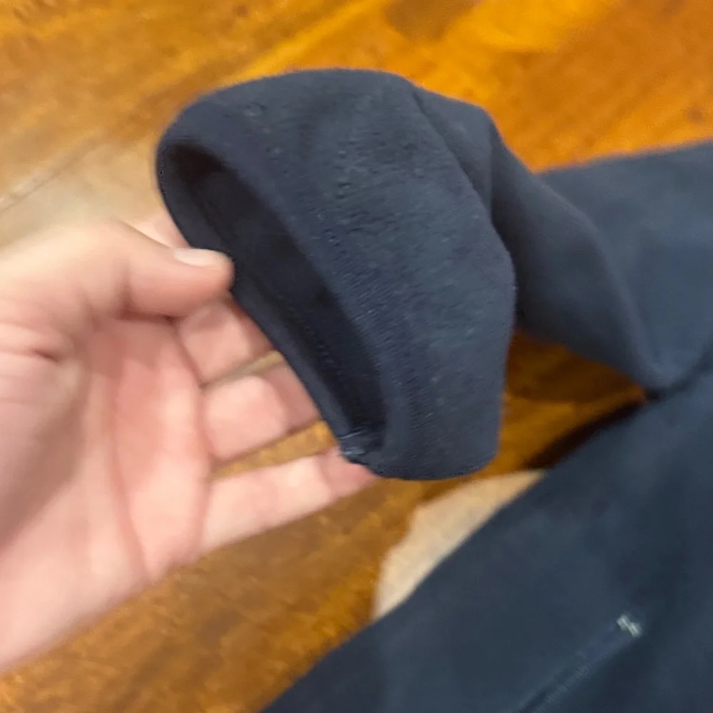 Genuine Merchandise navy zip